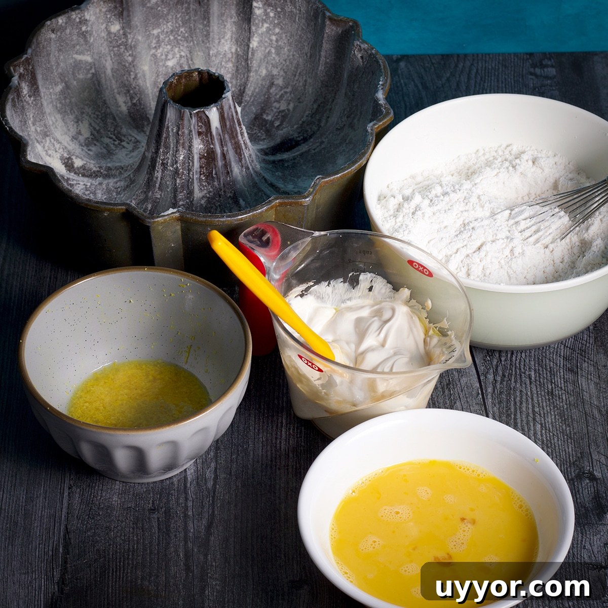 Lemon Bundt Cake with Zesty Tart Lemon Glaze 5 Ingredients for lemon bundt cake prepped and ready to use.