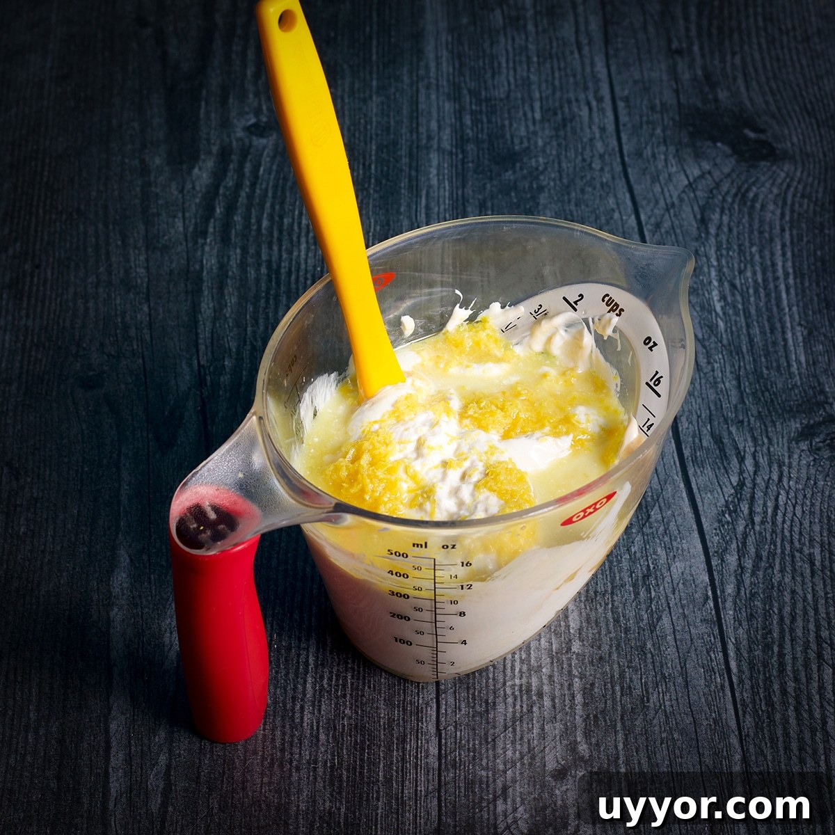 Lemon Bundt Cake with Zesty Tart Lemon Glaze 6 Stirring lemon extract and lemon juice into sour cream.
