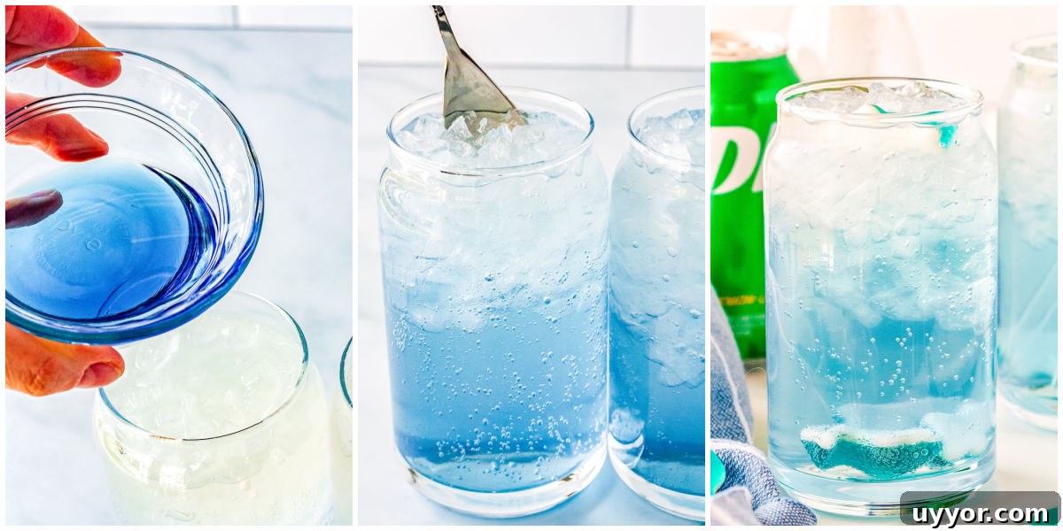 Copycat Swig Shark Attack Drink Recipe — How to Make It at Home 6 Blue raspberry syrup poured in, mixed, and garnished with a gummy shark.