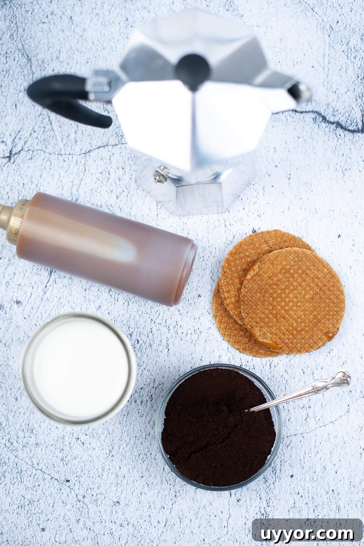Copycat Crème Brûlée Latte Recipe Like Starbucks 3 Multiple ingredients are placed on a white countertop.