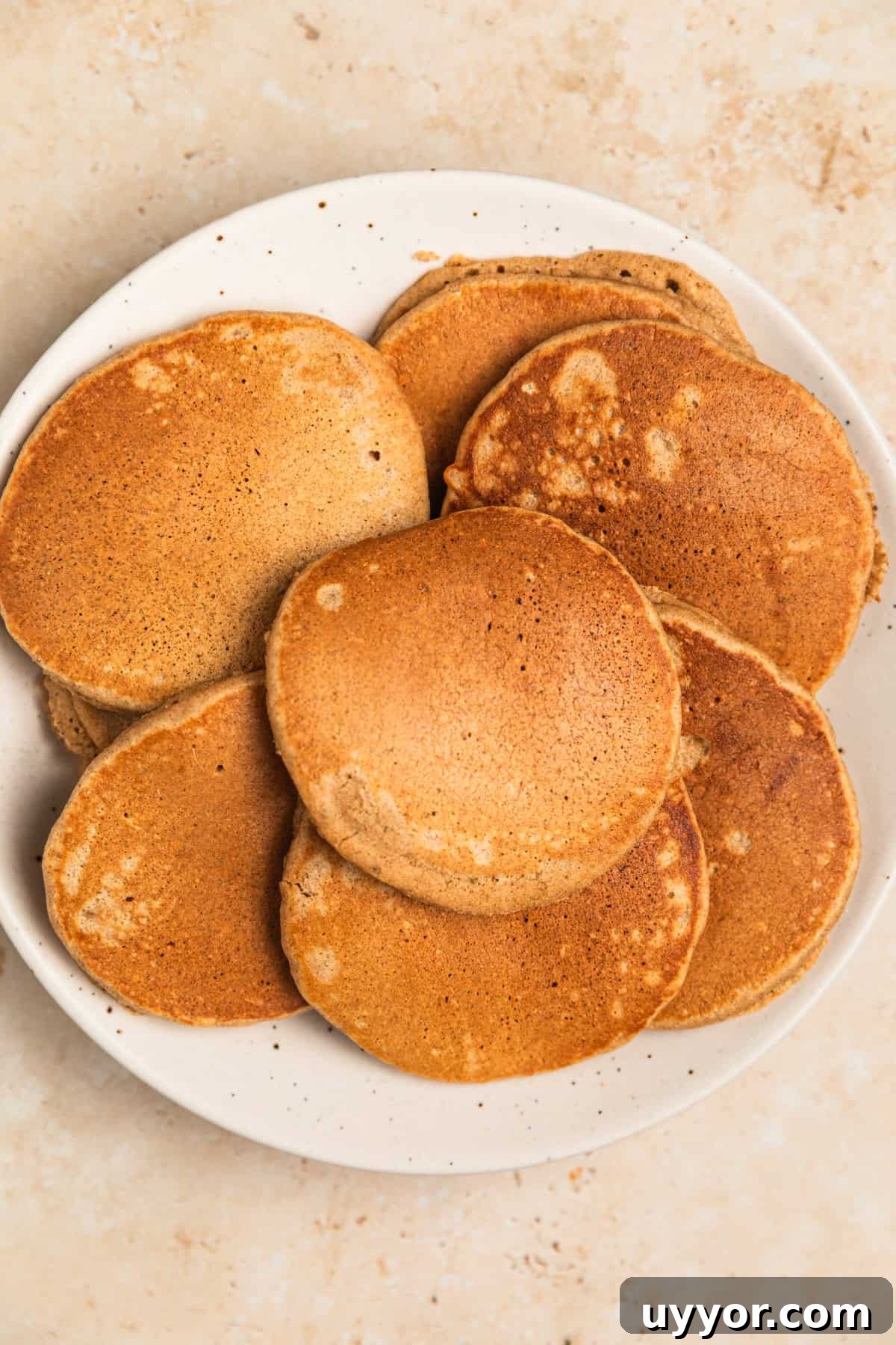Apple oat pancakes on plate.