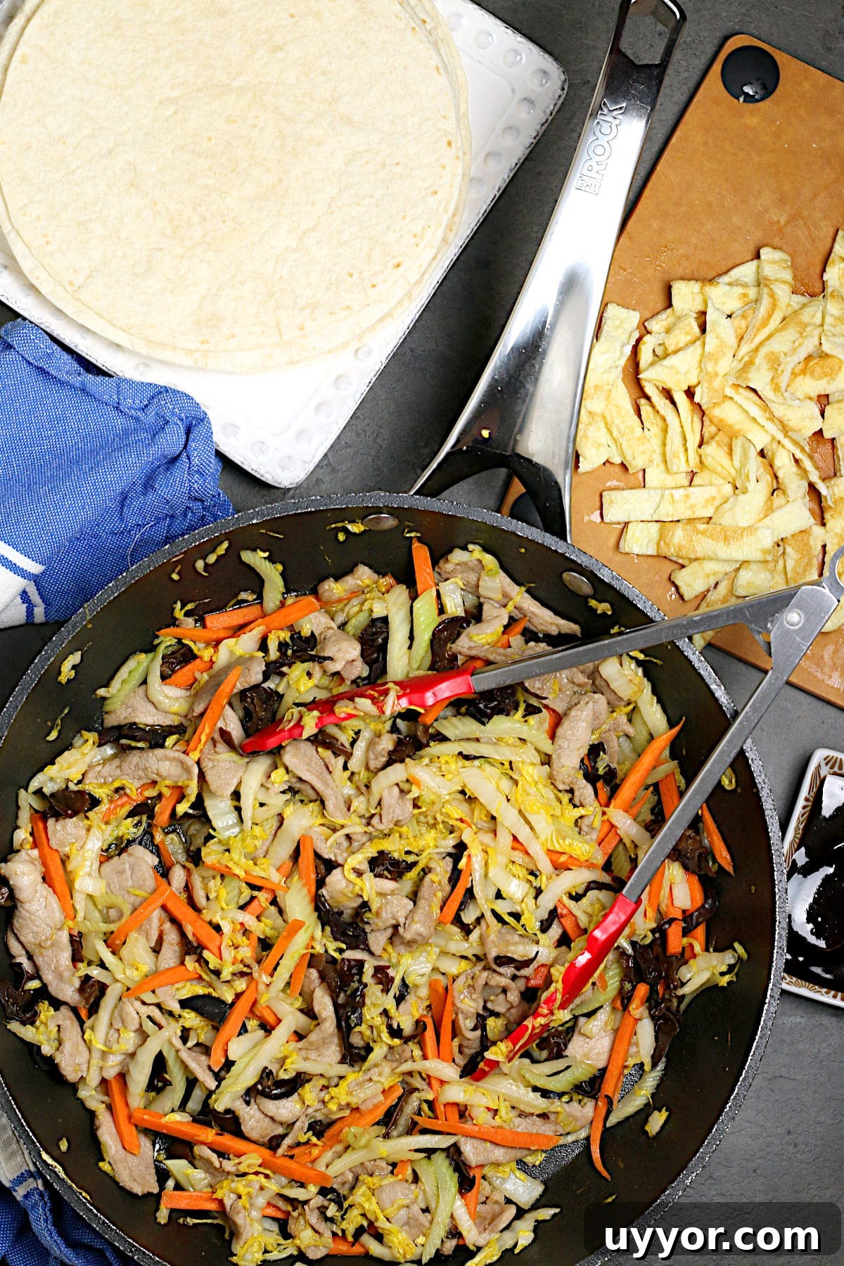 Weeknight Moo Shu Pork Recipe with Quick Hoisin Wraps 2 An overhead photo of Easy Weeknight Moo Shu Pork in a skillet.