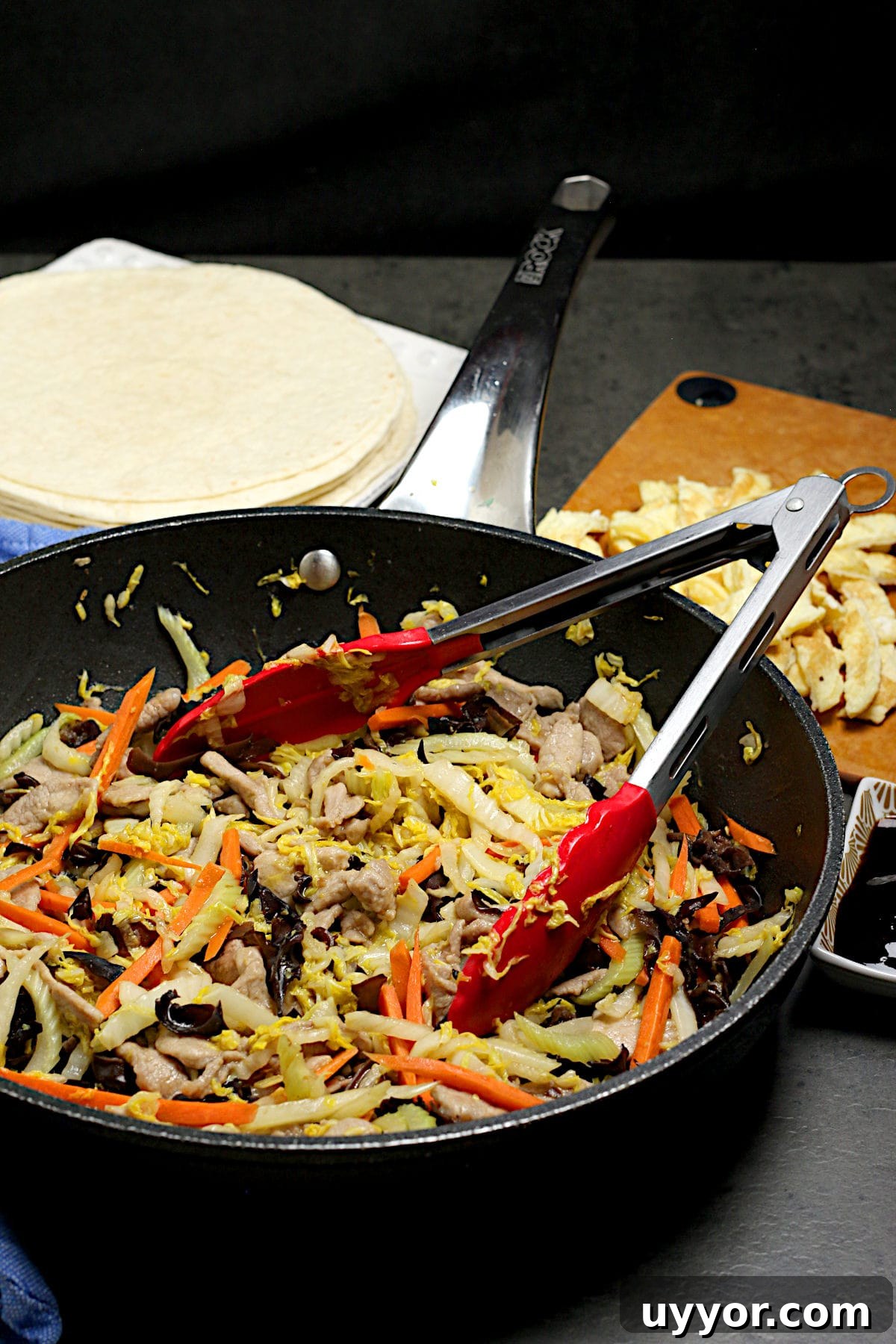 Weeknight Moo Shu Pork Recipe with Quick Hoisin Wraps 3 Easy Weeknight Moo Shu Pork in a skillet.