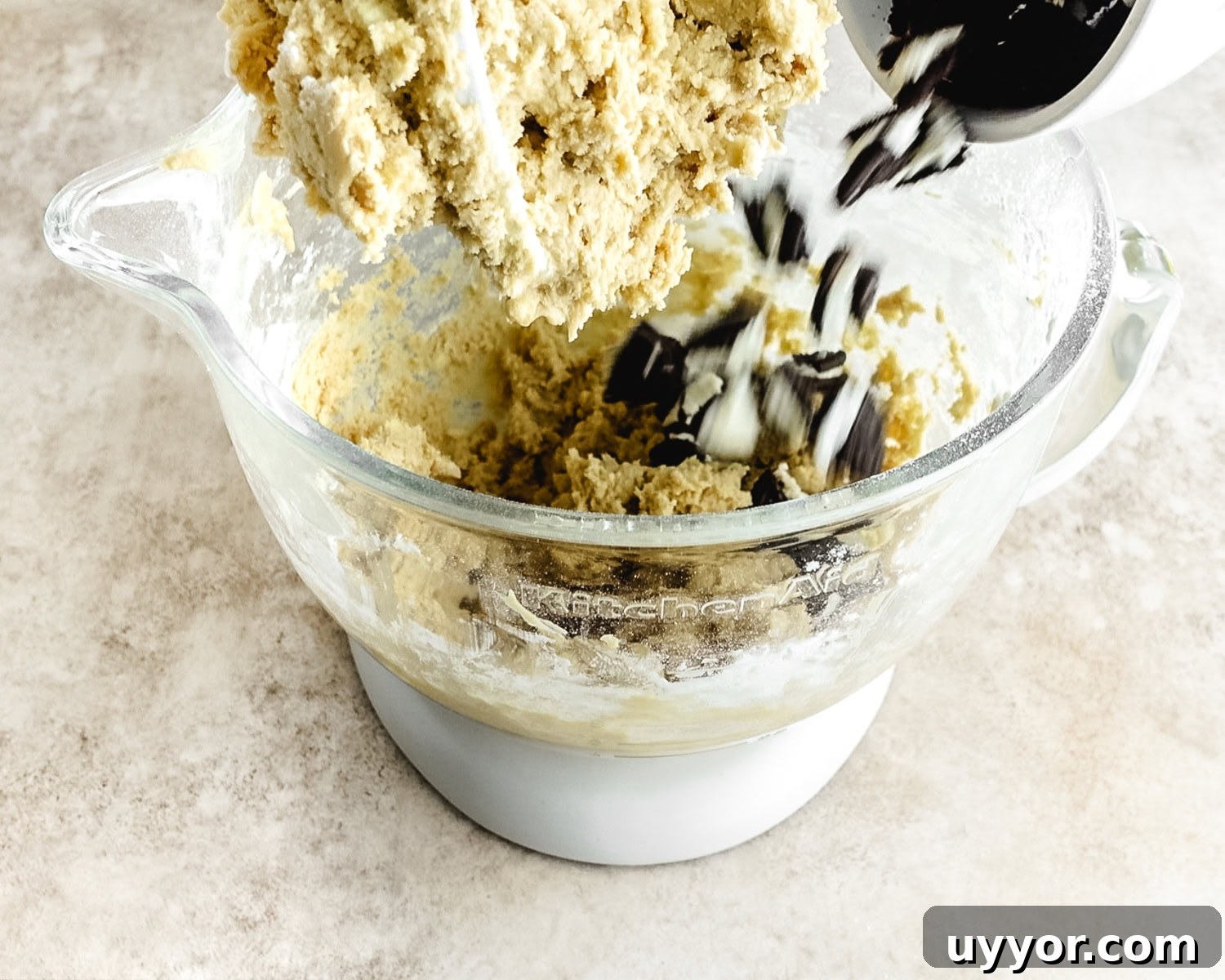 Add crushed Oreos to the cookie dough.