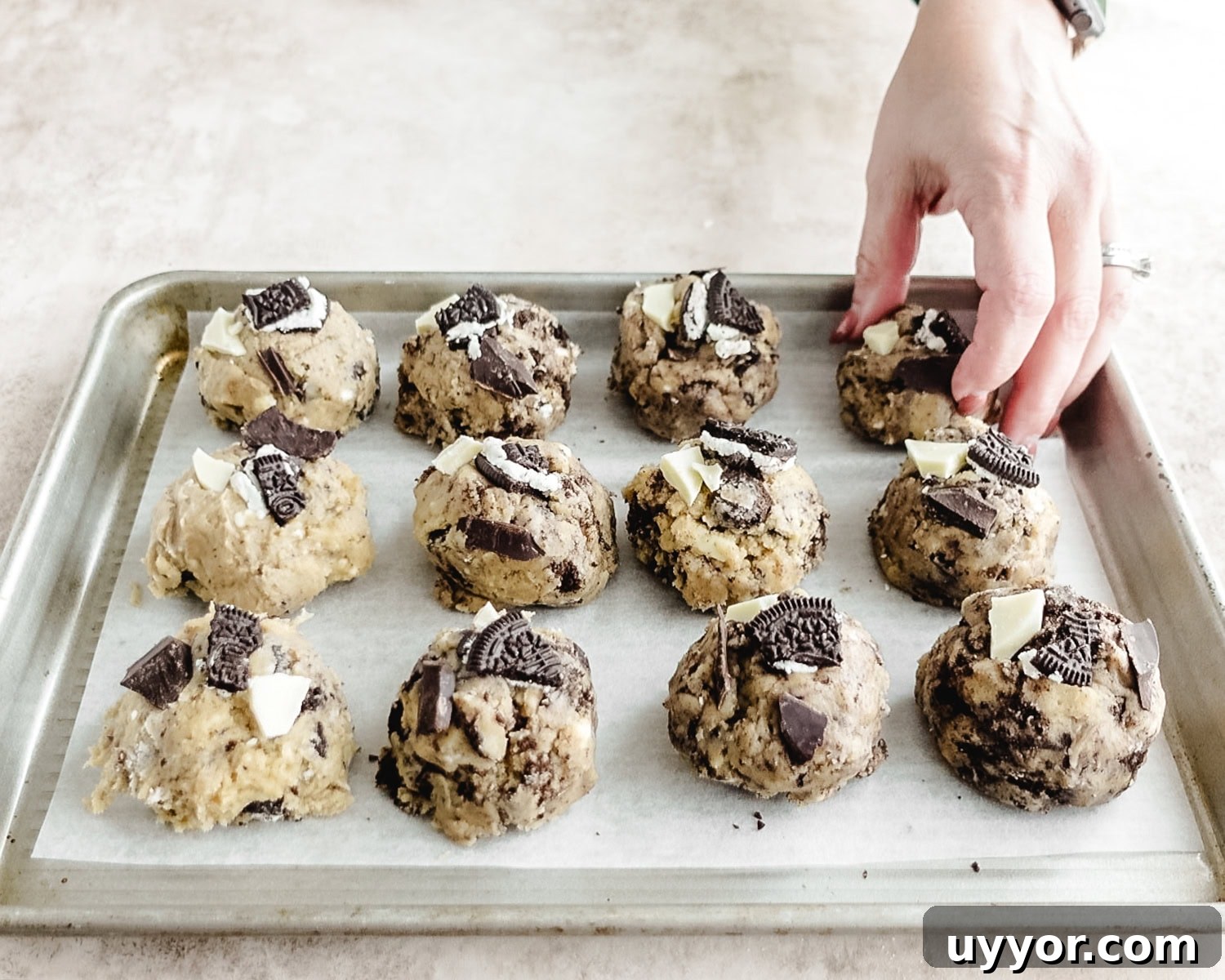 Place cookie dough balls in a single layer on a parchment lined baking sheet and place in the freezer.