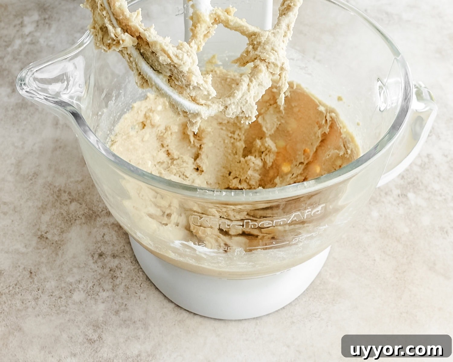 Mix well until creamy and sticking to the sides of the bowl.
