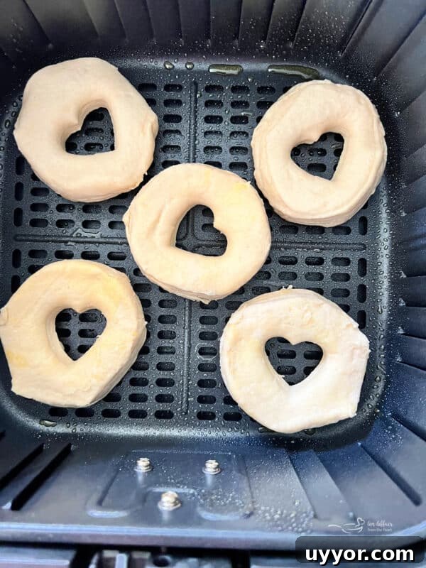 Pumpkin Spice Air Fryer Biscuts Donuts -> wait that's not allowed. Must only final title. Provide optimized under 65 chars. Avoid words like easy, best, healthy. Natural & clickable. Possible: Air Fryer Pumpkin Spice Biscuit Donuts That's 34 chars. Good. 9 img 32111 8