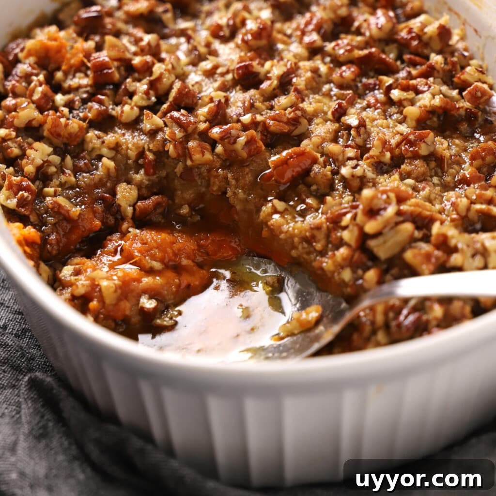 83-Recipe Meal Plan: Weekly Menus for Every Diet 6 Close up of a spoon serving some sweet potato crunch.