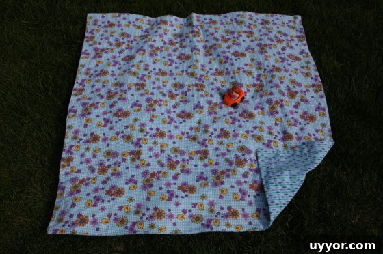 extra large, reversible receiving blanket with little people car on it