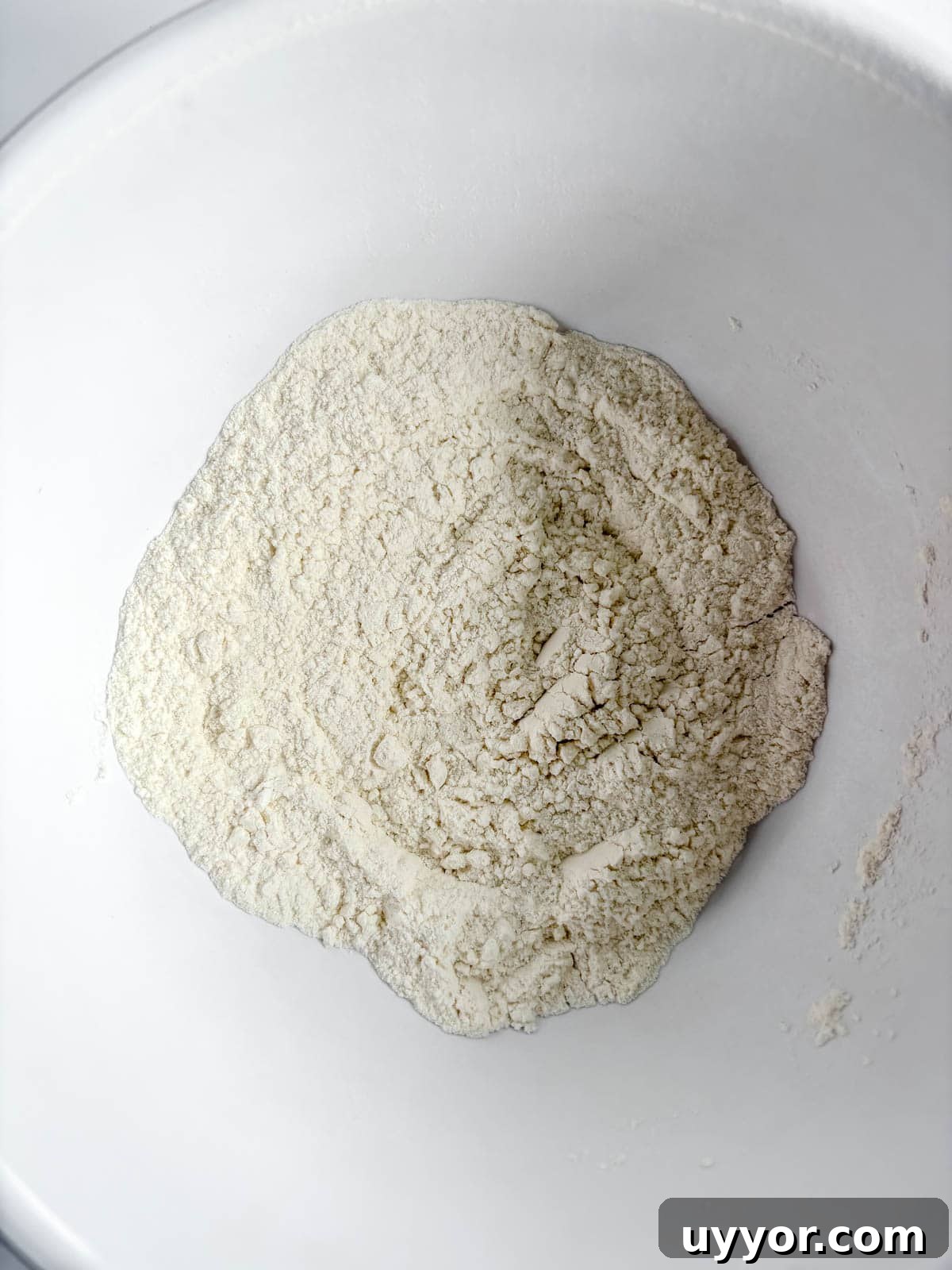 Mini Funfetti Cupcakes: Small-Batch Party Recipe for 12 5 Dry ingredients in a bowl to make funfetti cupcakes.