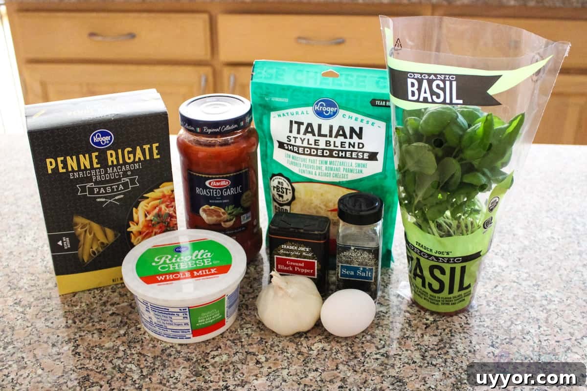 Cheesecake Factory Four-Cheese Pasta Copycat Recipe 3 Four Cheese Pasta Ingredients on a kitchen counter