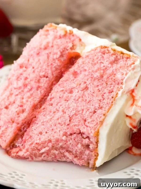 pink strawberry cake on white plate