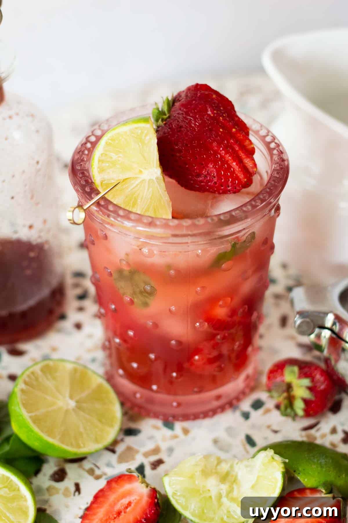 Strawberry Mojito Mocktail Recipe: Refreshing Non-Alcoholic Cocktail 2 Strawberry Mojito Mocktail with lime and strawberry