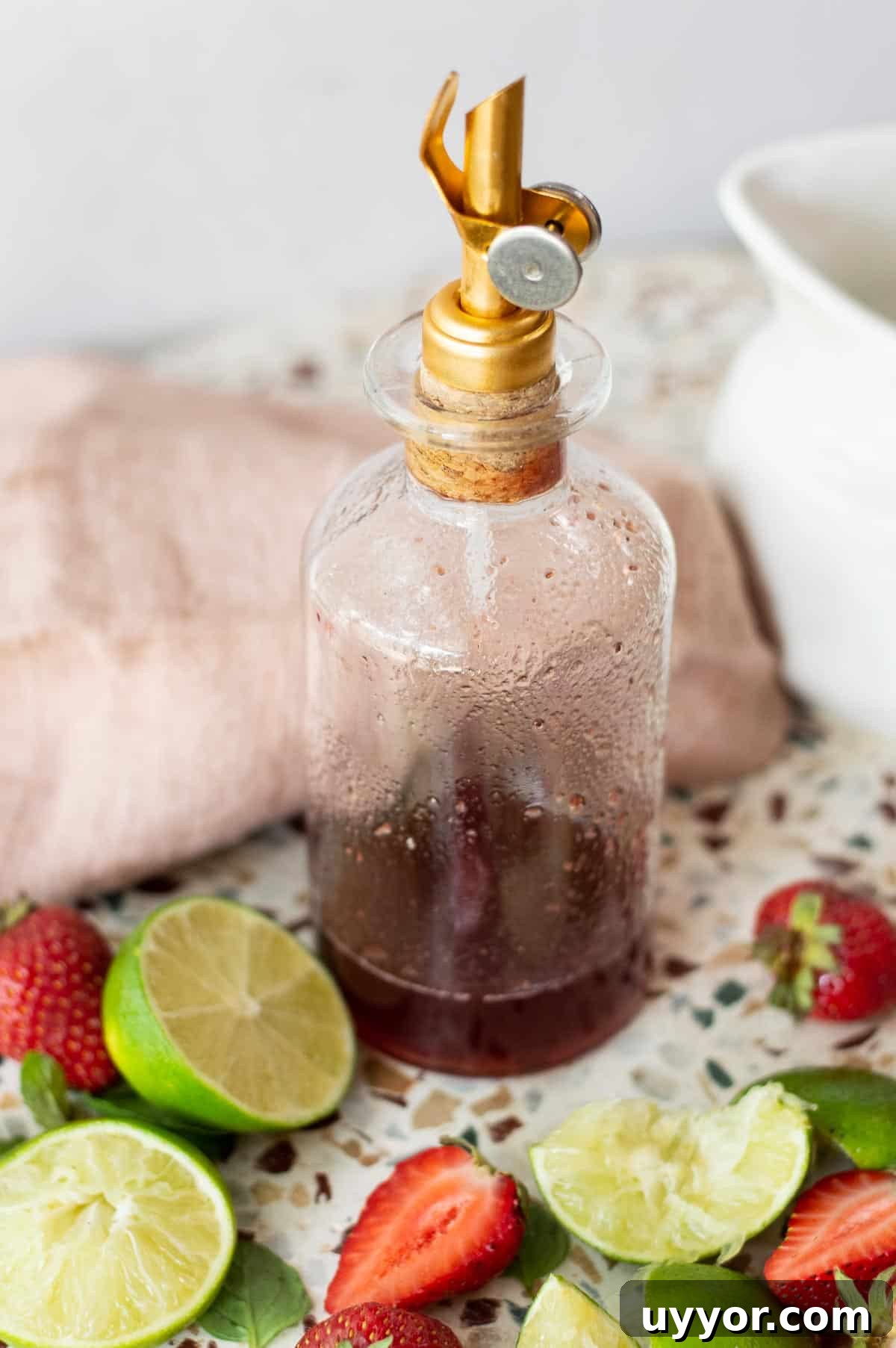 Strawberry Mojito Mocktail Recipe: Refreshing Non-Alcoholic Cocktail 4 Strawberry Mojito Mocktail syrup in a glass bottle