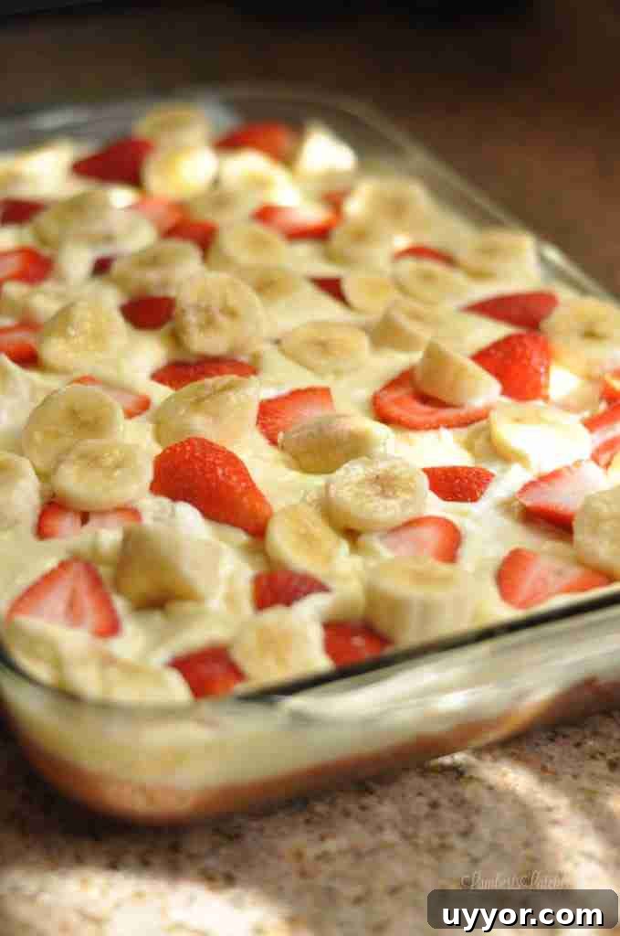 Strawberry Banana Pudding Cake Recipe — Moist Layer Cake 2 This recipe for Strawberry Banana Poke Cake is an easy recipe made with rich banana pudding and fresh strawberries.