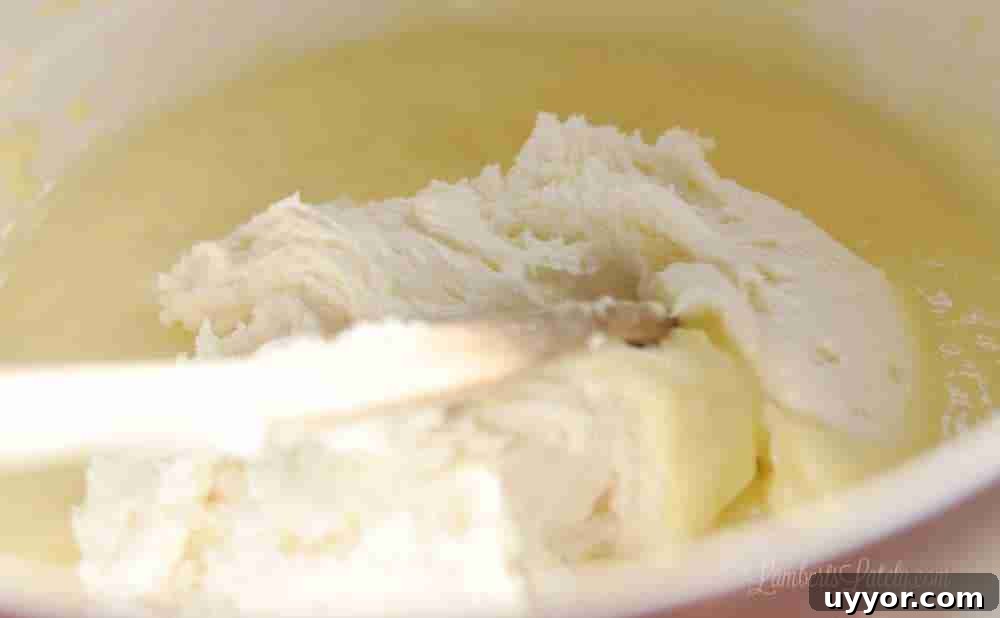 Strawberry Banana Pudding Cake Recipe — Moist Layer Cake 9 folding whipped cream into pudding mix.