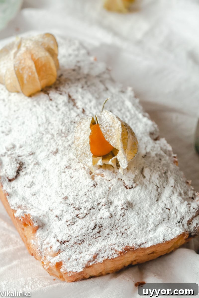 Stolichny Keks: Authentic Russian Pound Cake Recipe 3 top down view of a pound cake dusted with icing sugar