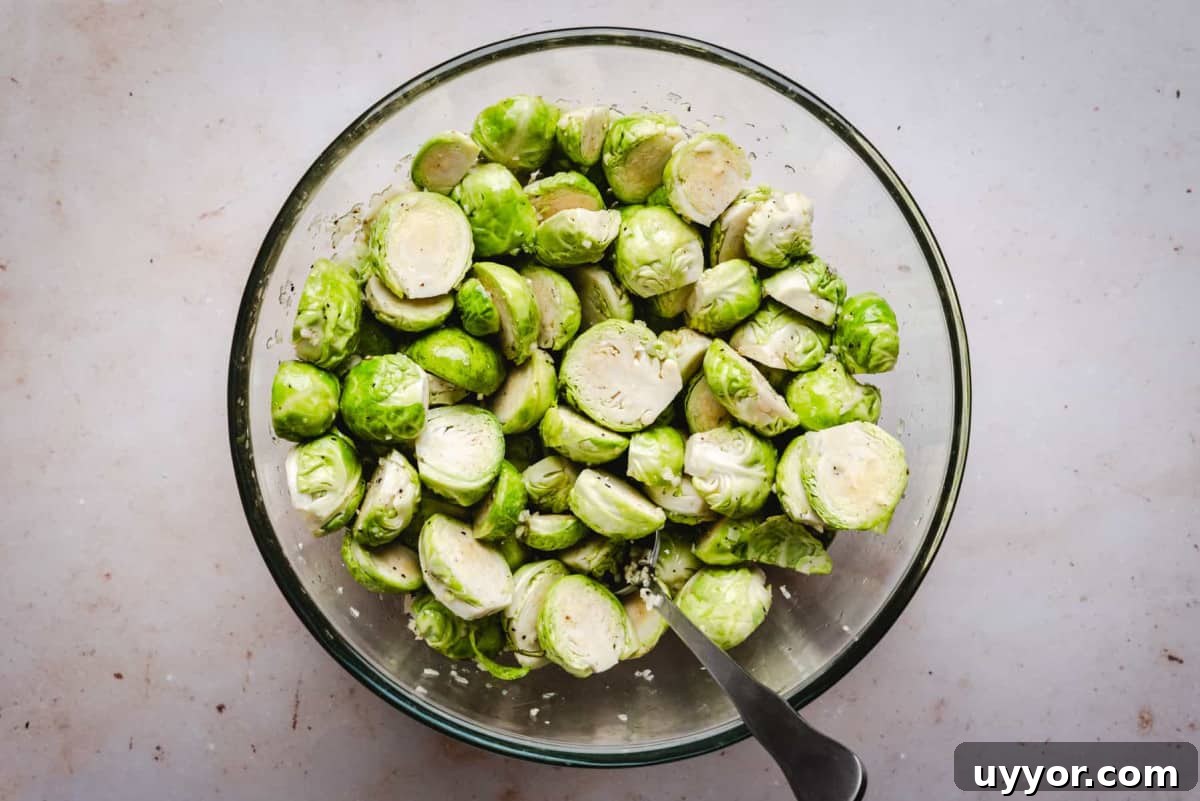 halved brussels sprouts tossed with cheese and seasonings.
