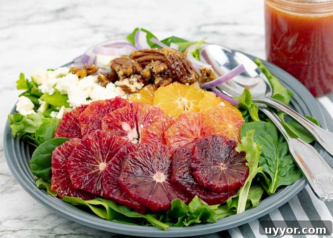 Blood Orange Citrus Salad with Orange Vinaigrette on a gray plate