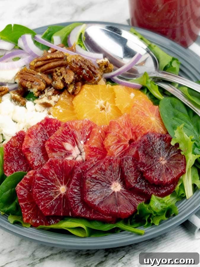 Blood Orange Citrus Salad with Orange Vinaigrette on a gray plate