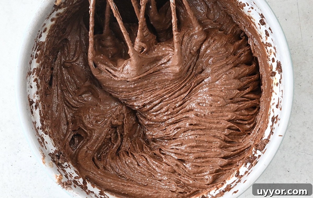 banana chocolate cake batter in a bowl 