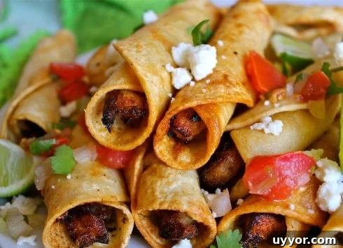 crispy homemade chicken flautas with queso fresco, pico de gallo, and fresh lime.