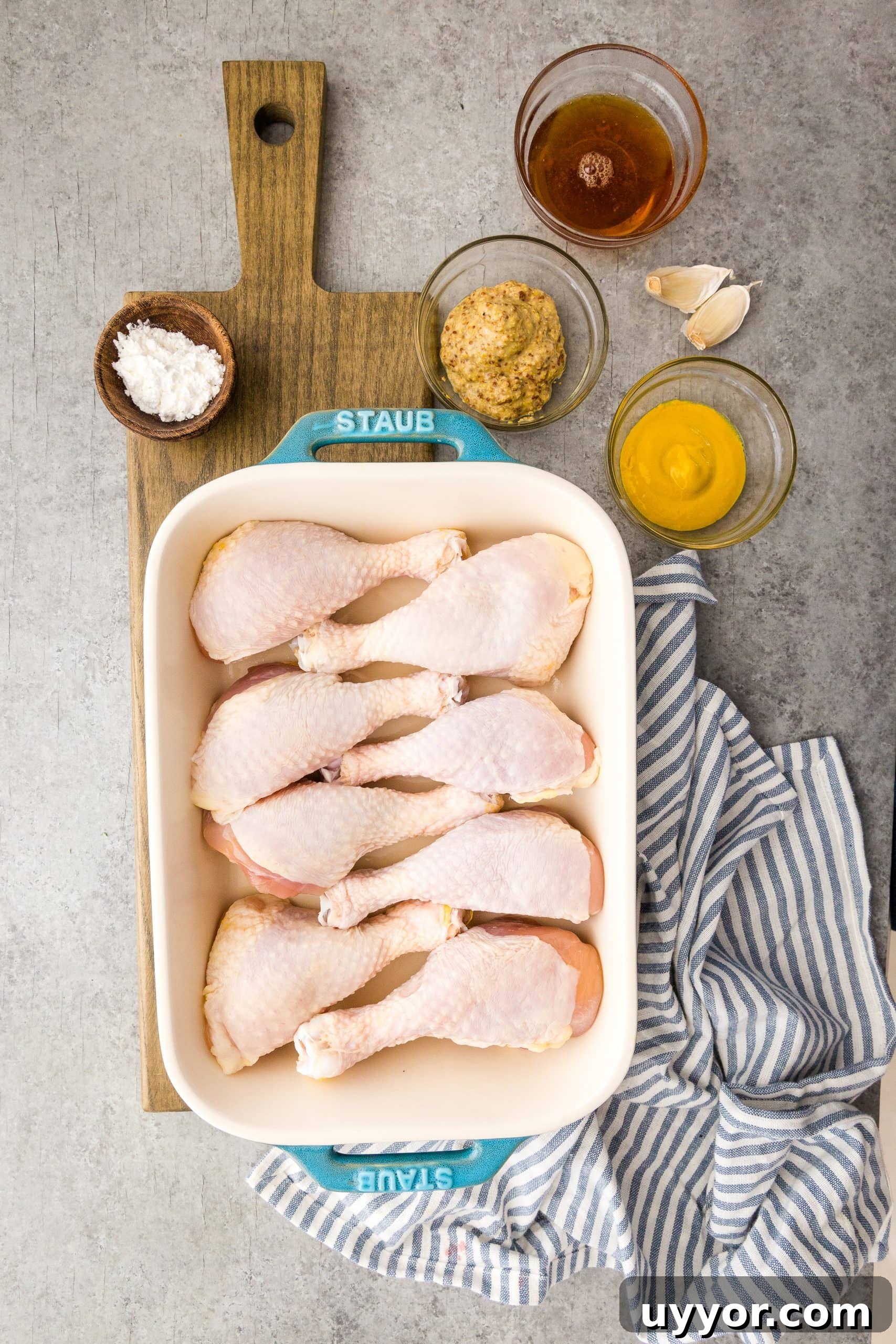 Crispy Honey Mustard Baked Chicken Drumsticks Recipe 5 Honey Mustard Baked Chicken Drumsticks Recipe displayed on a table.
