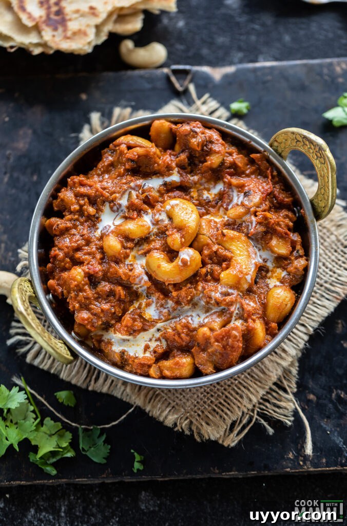 cashews with spices served in a copper kadai