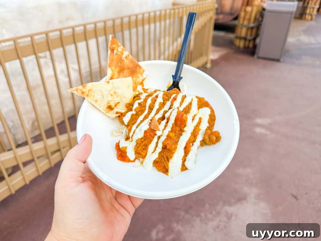Top Tips for Navigating Epcot Festivals Like a Pro 6 plate of food from one of the food booths at an Epcot Festival.