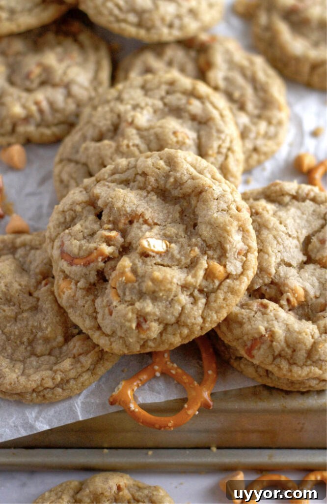 Butterscotch Pretzel Cookie Recipe: Sweet & Salty Treat 13 a pile of cookies with pretzel bits and butterscotch chips
