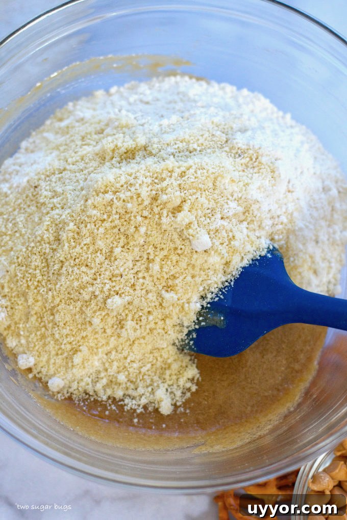Butterscotch Pretzel Cookie Recipe: Sweet & Salty Treat 7 all-purpose and almond flour being mixed into cookie dough