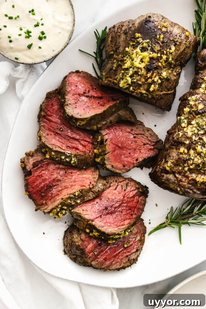 Top 10 Must-Try Recipes from 2022: Reader Favorites and Trends 5 Slices of beef tenderloin on a plate.