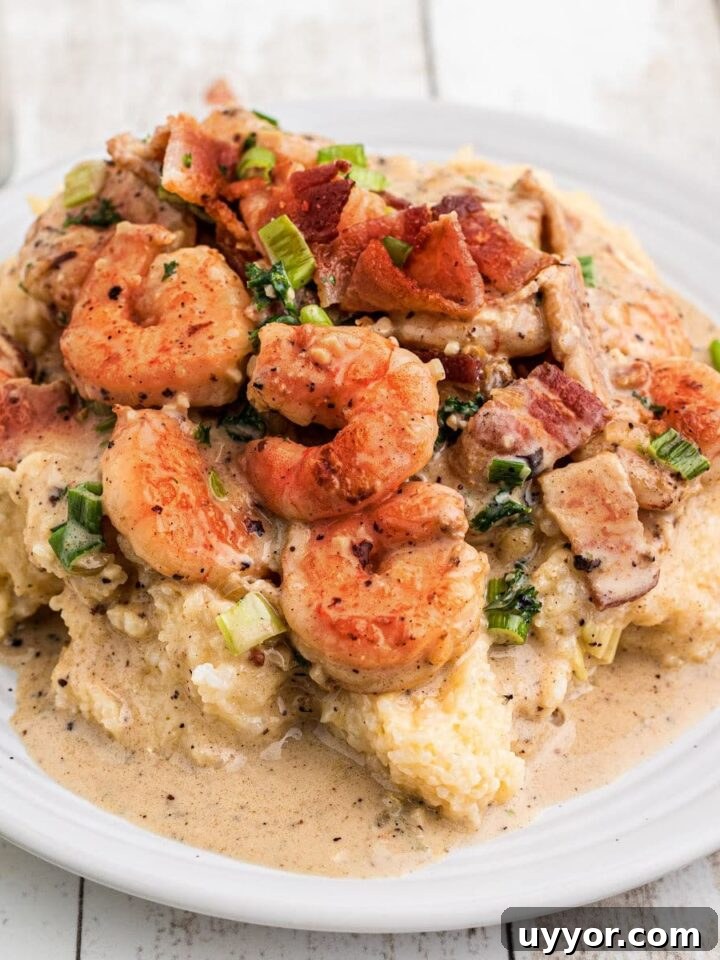 Shrimp and grits with some delicious bacon and green onions sprinkled on top.