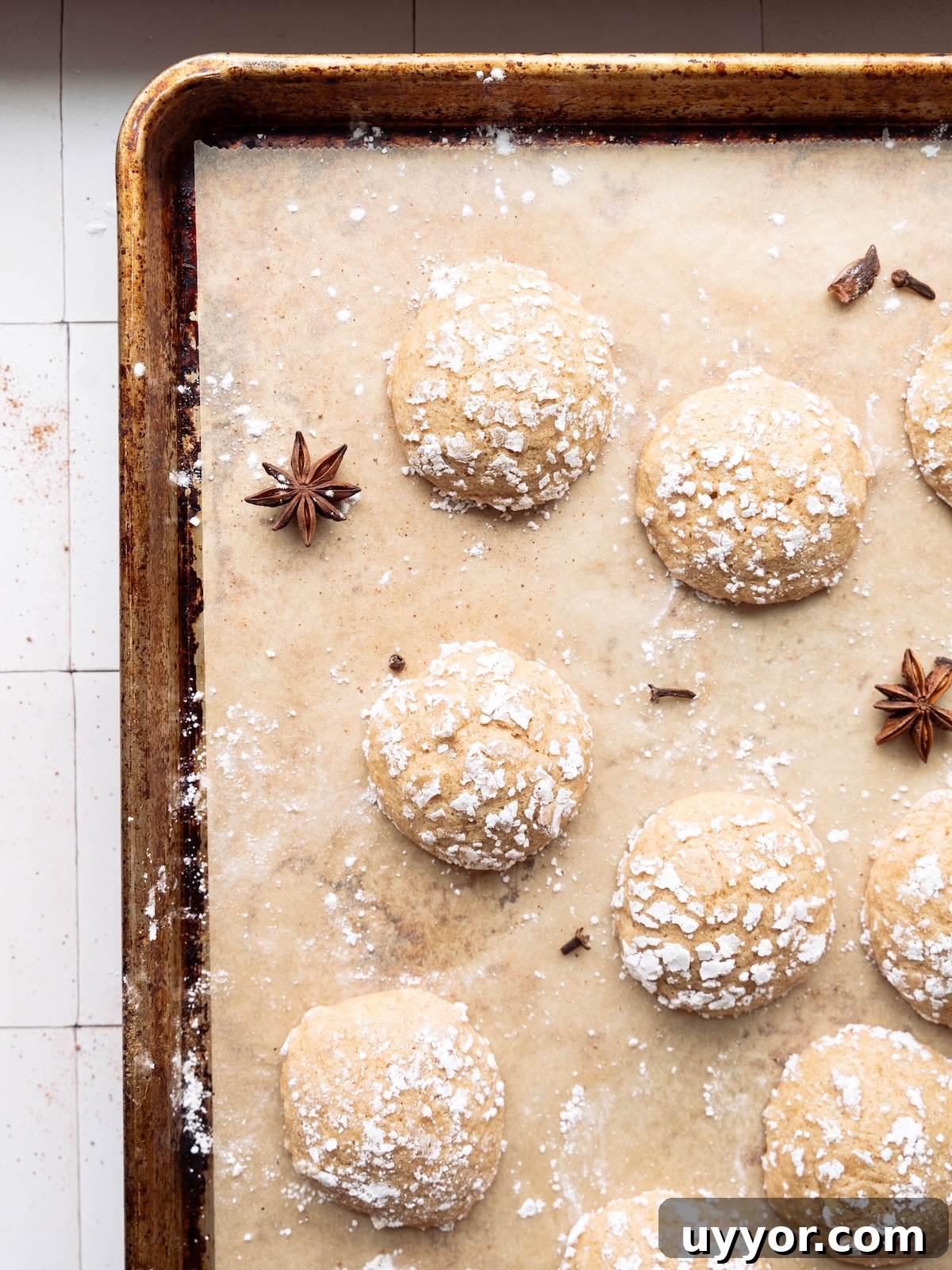 Chai-Spiced Crinkle Cookies Recipe for Cozy Homemade Treats 3 Soft chai cookies on a baking sheet