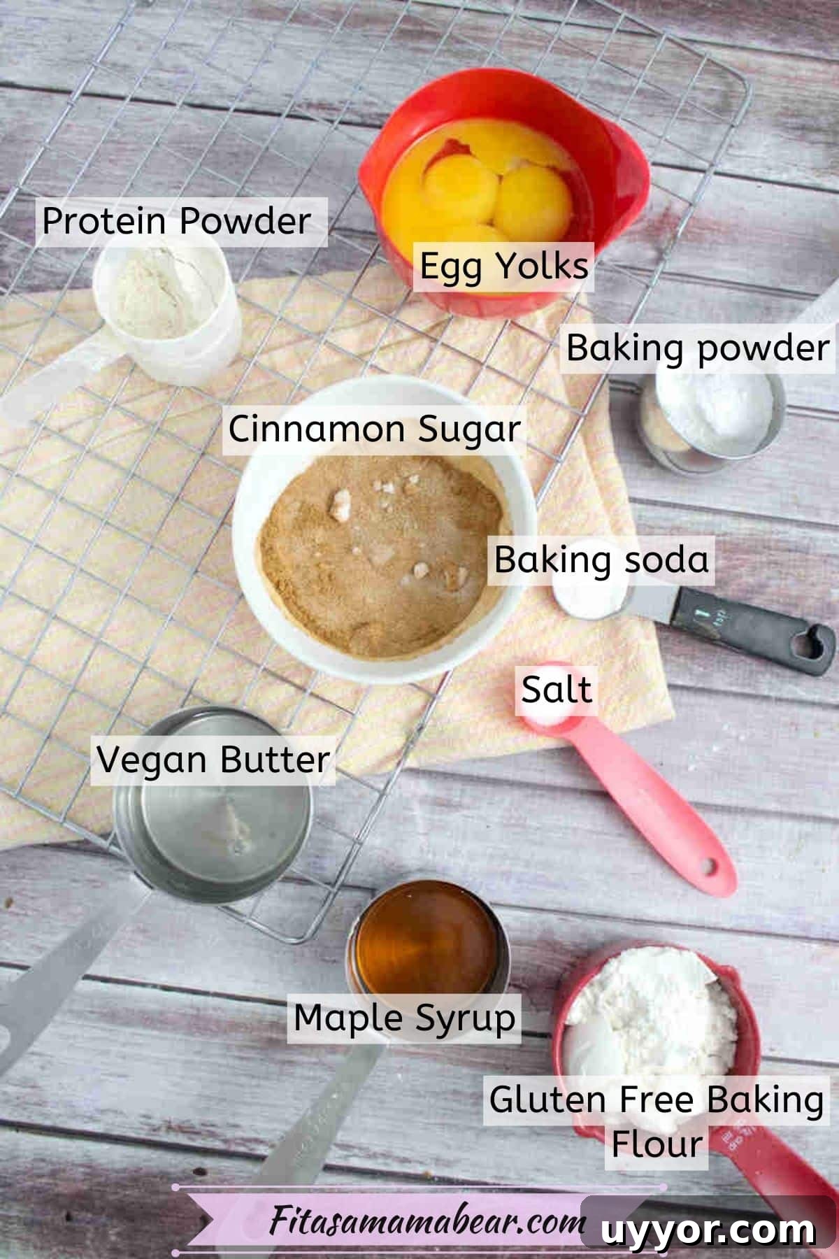 Multiple ingredients to make snickerdoodle protein cookies in measuring cups with text labels over top.