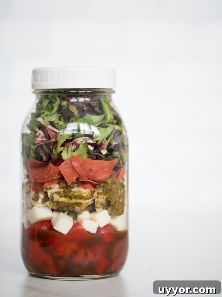 Pesto Chicken Mason Jar Salad Recipe for Meal Prep 11 pesto chicken mason jar salad in a jar