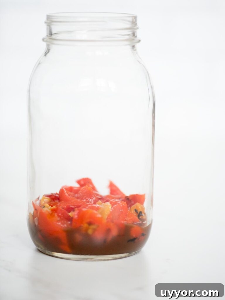 Pesto Chicken Mason Jar Salad Recipe for Meal Prep 5 roasted red peppers and balsamic vinaigrette in a jar