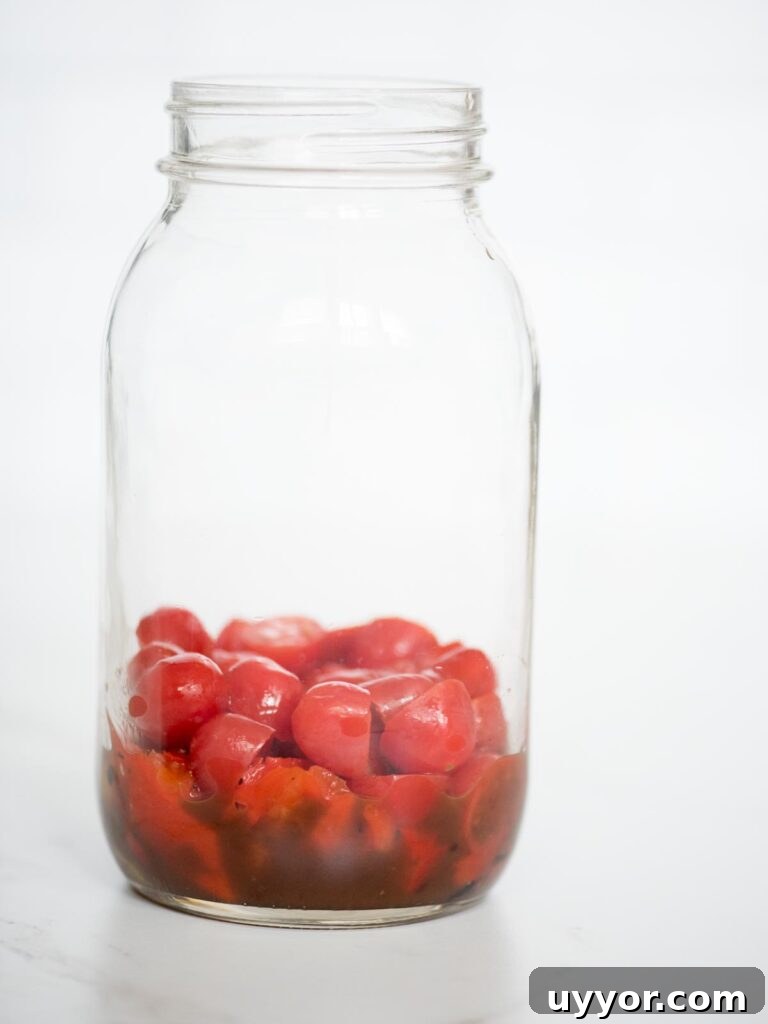 Pesto Chicken Mason Jar Salad Recipe for Meal Prep 6 balsamic vinaigrette, roasted peppers, and grape tomatoes in a jar