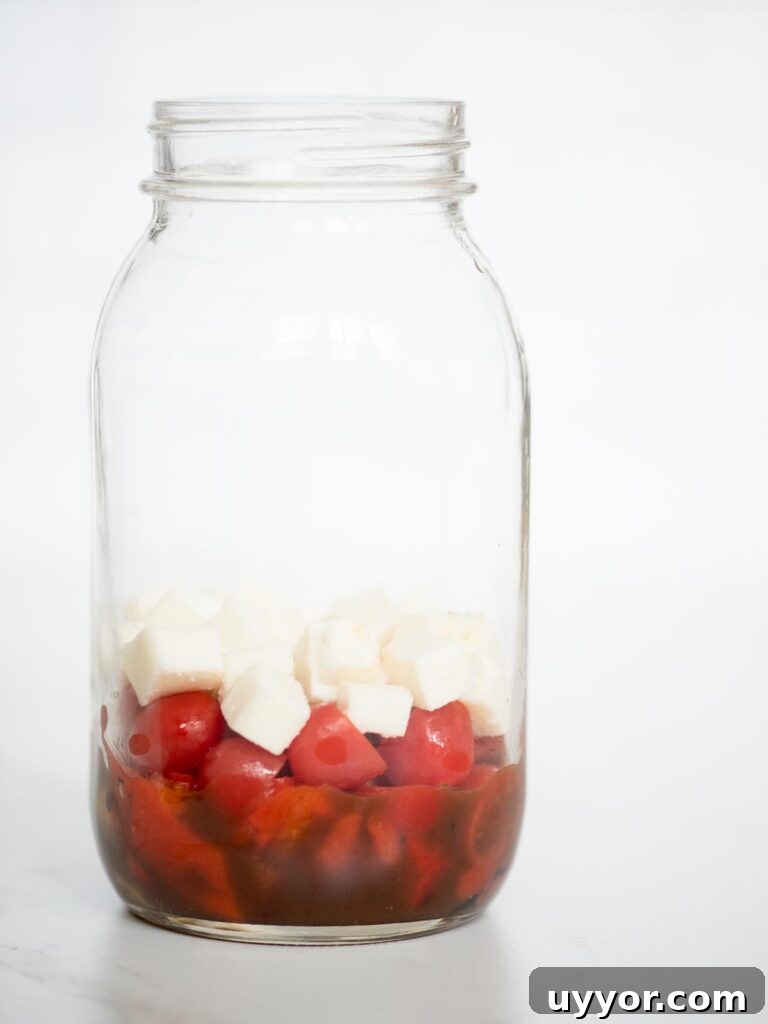 Pesto Chicken Mason Jar Salad Recipe for Meal Prep 7 balsamic vinaigrette, roasted peppers, grape tomatoes, and mozzarella in a jar
