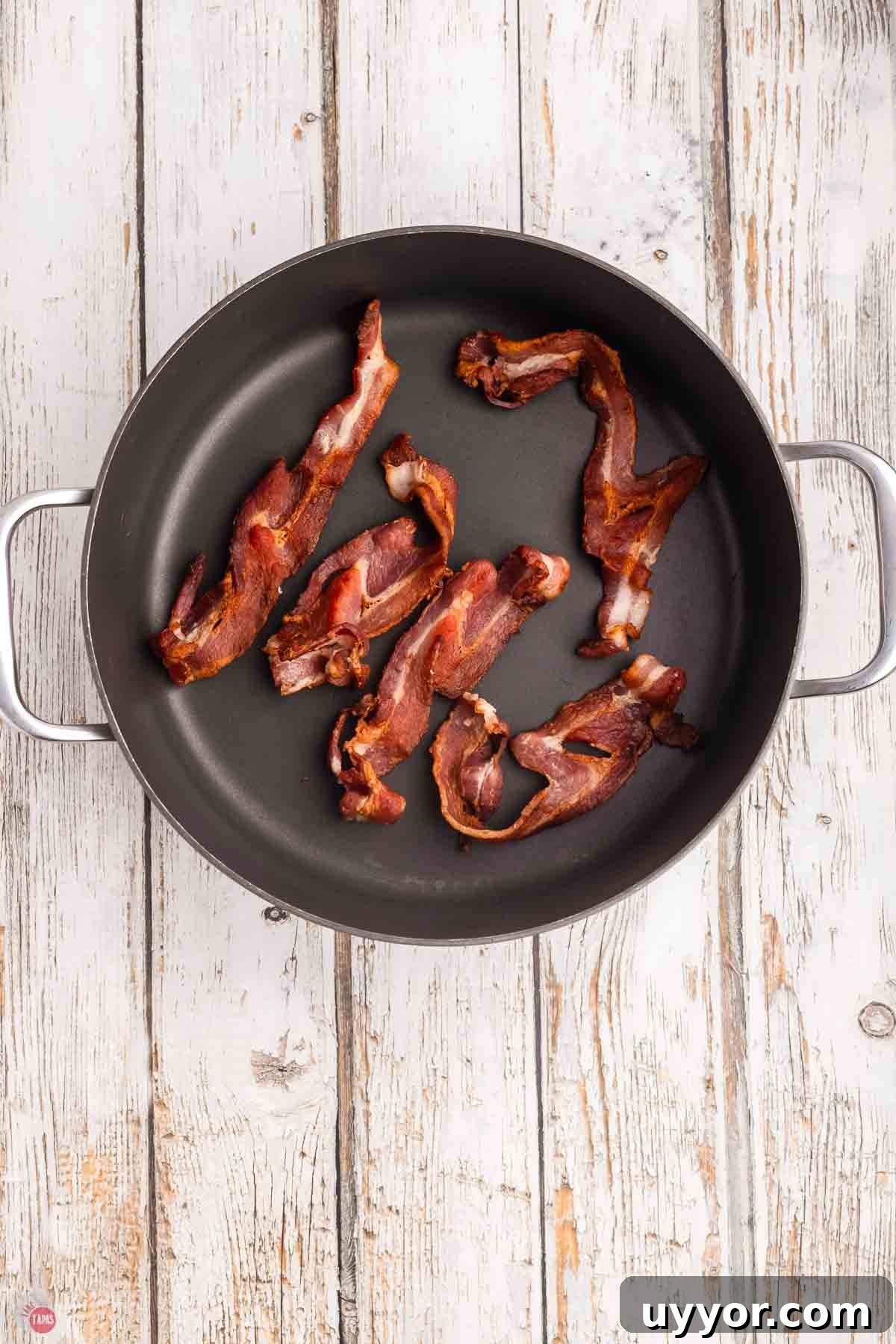 cooked bacon in a skillet