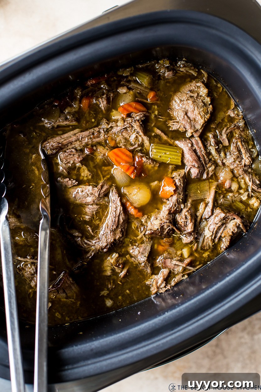 Slow Cooker Italian Beef Sandwiches with Tangy Au Jus 3 Up close overhead photo of Slow Cooker Italian Beef