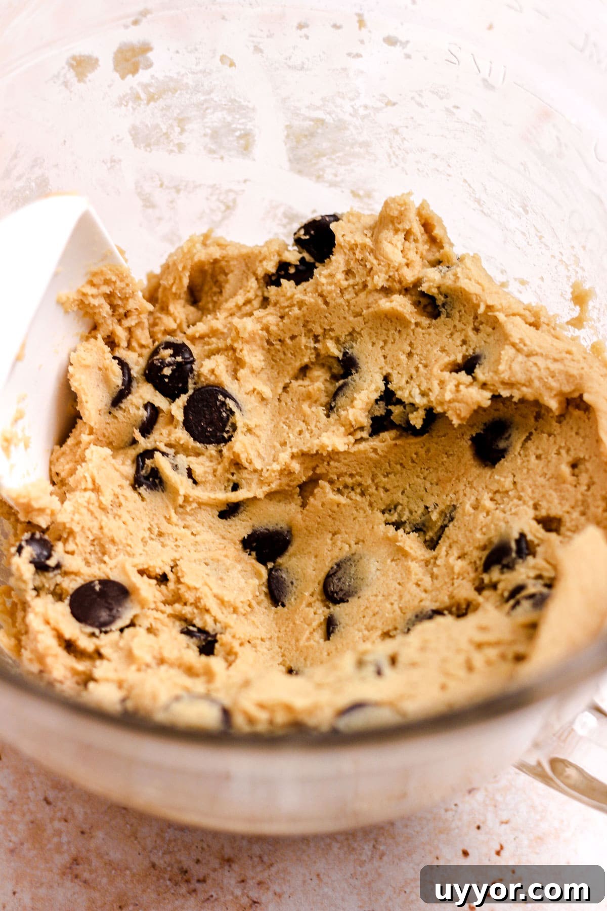 Freeze Cookie Dough and Bake from Frozen: Step-by-Step Guide 3 Chocolate chip cookie dough in a glass bowl.