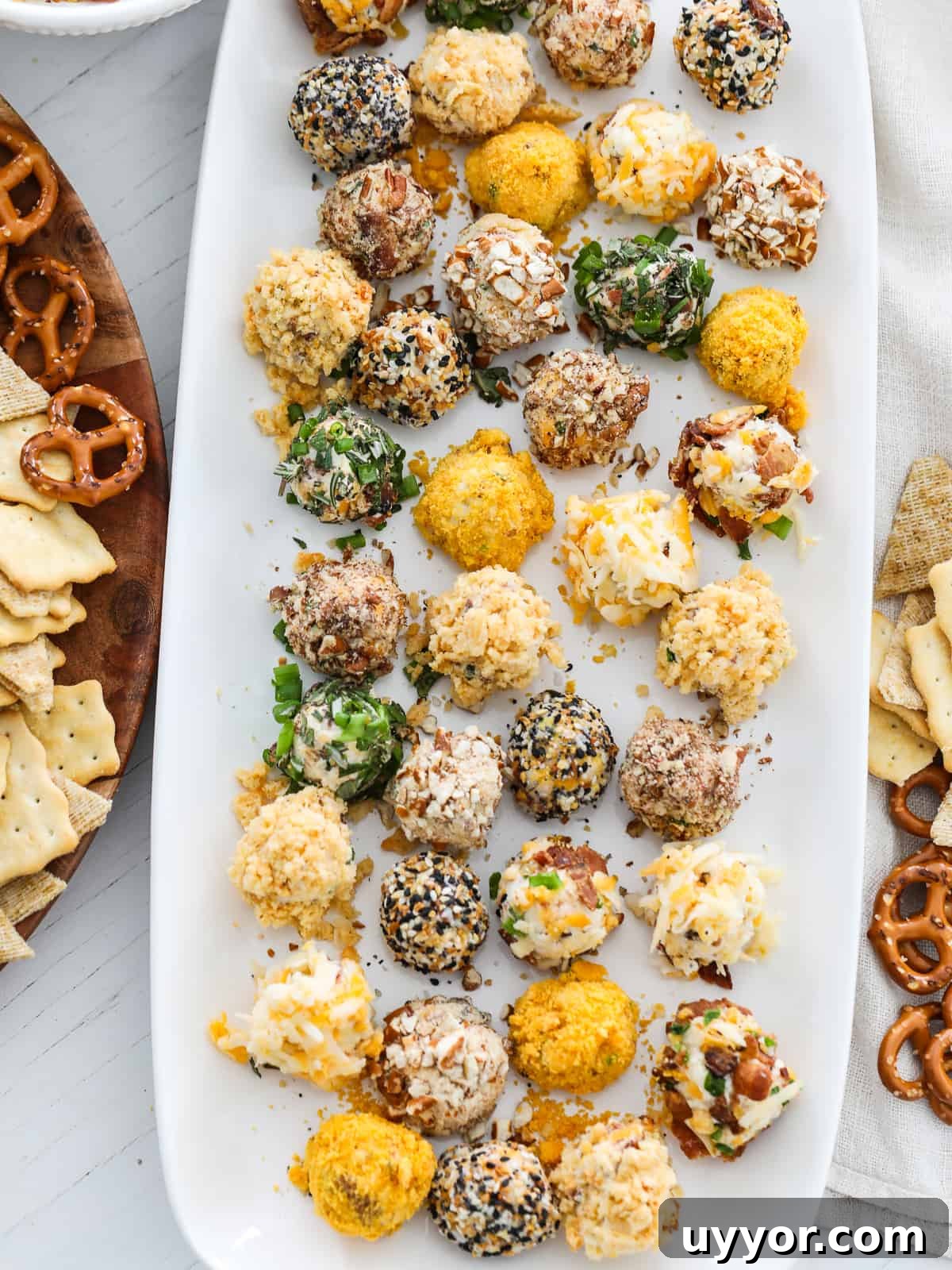 Savory Mini Cheese Truffles: Bite-Sized Party Cheese Balls 13 Cheese truffles with crackers and pretzels