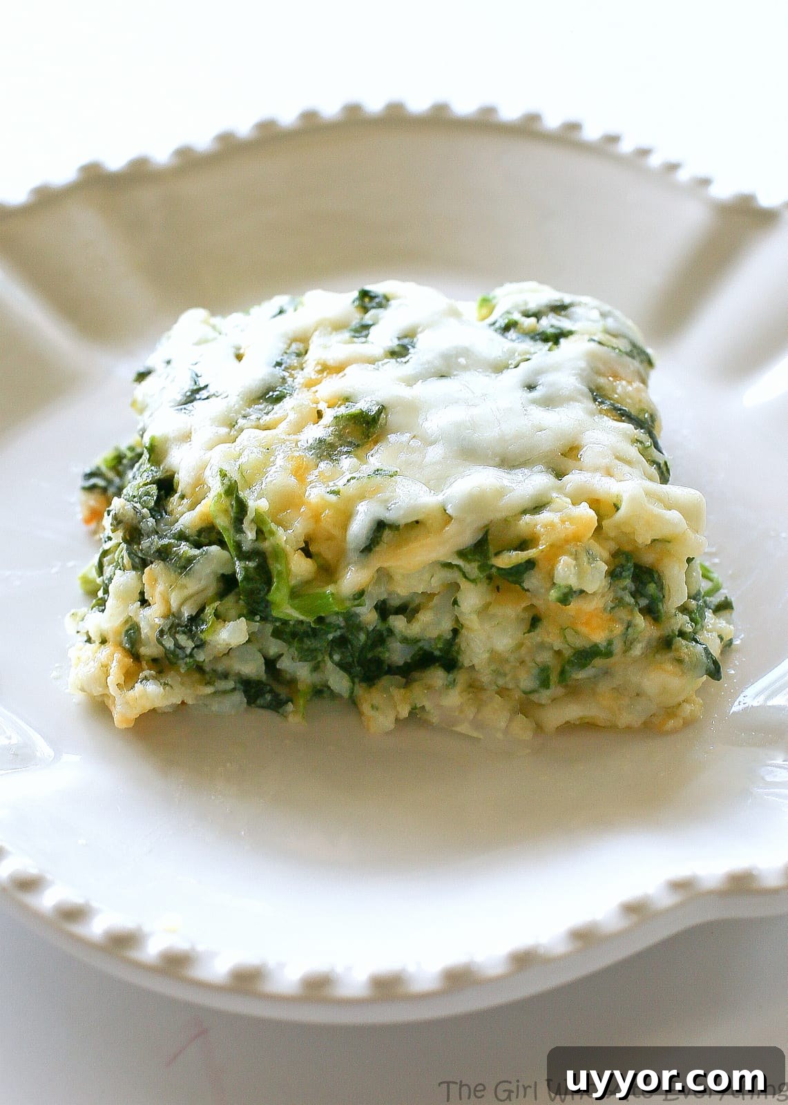 Spinach Parmesan Rice Bake - a cheesy side dish with spinach, cheese, and rice.
