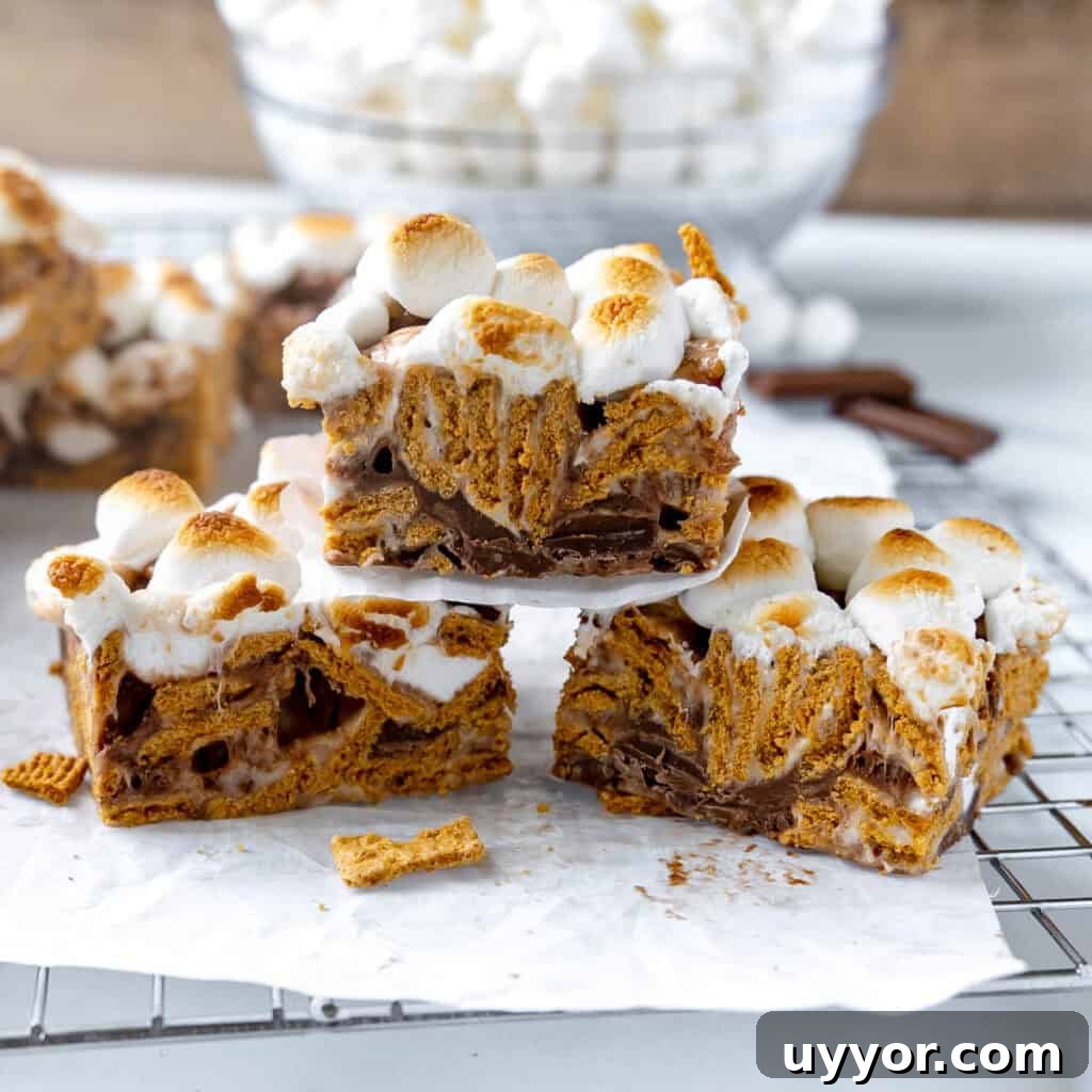 Patriotic Red White & Blue Chex Mix Recipe for 4th of July 11 Three S'mores bars stacked on top of each other.