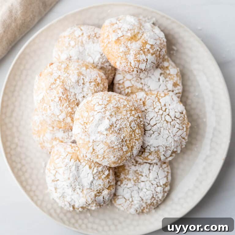 Chewy Ricciarelli: Traditional Italian Almond Cookies 10 A plate of Ricciarelli cookies.