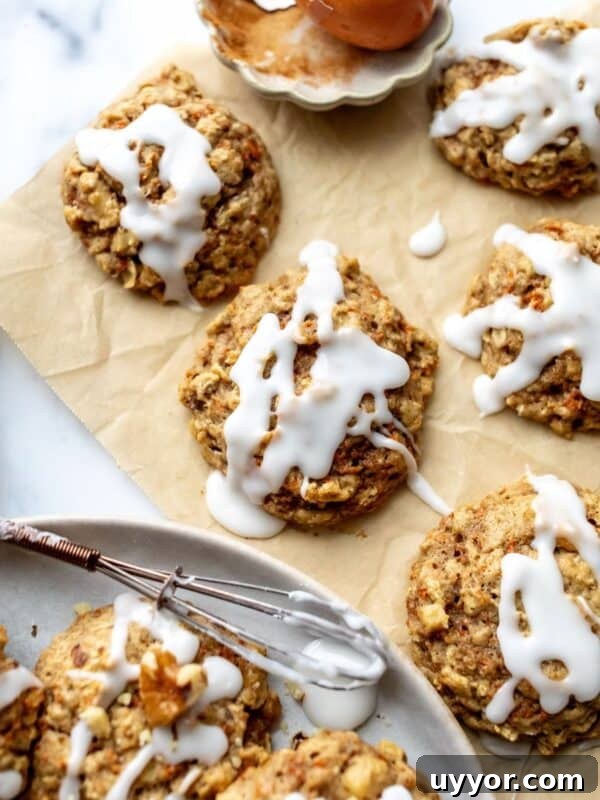carrot cake cookies on parchment paper.