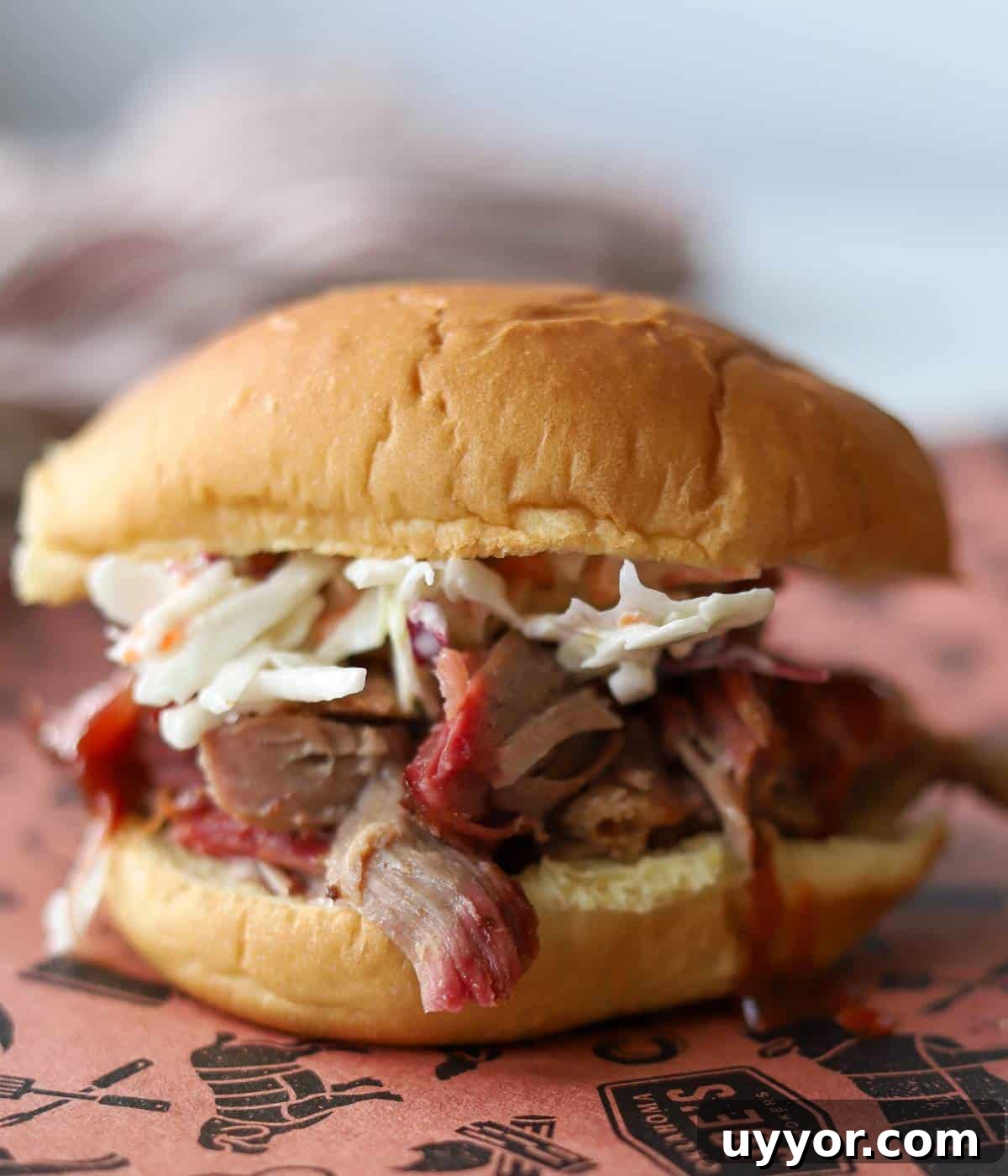 How to Smoke a Pork Butt for Tender, Flavorful Pulled Pork 13 pulled pork sandwich on butcher paper