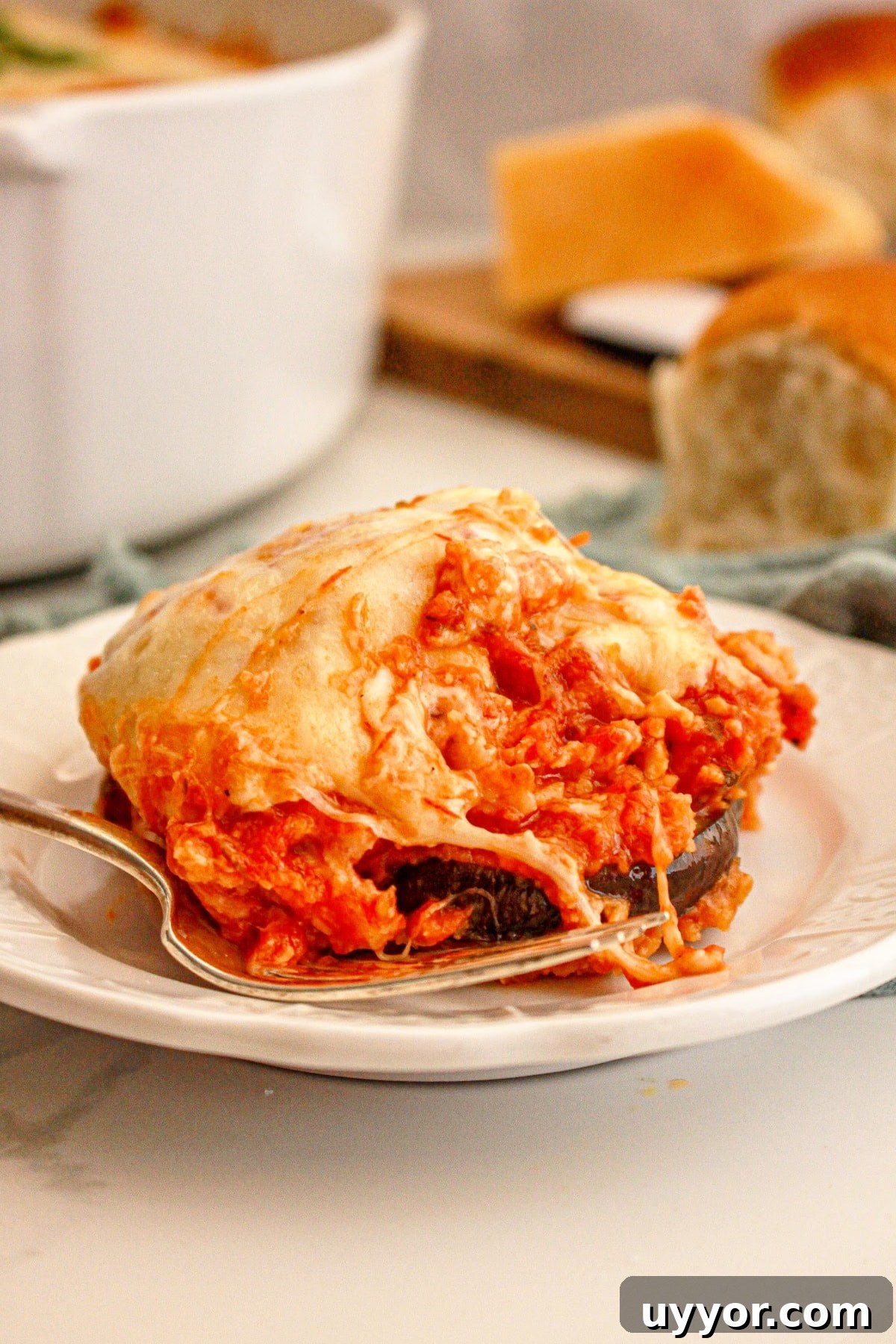 Classic Homemade Eggplant Parmesan Recipe for Crispy Layers 2 Serving of eggplant parmesan on a plate.
